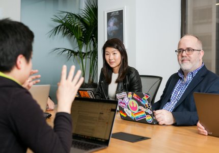 People sat in a meeting